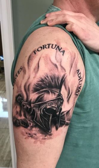 Spartan tattoo on the shoulder for men