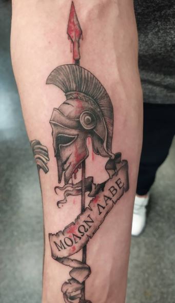 Spartan tattoo on forearm for men