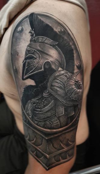 Spartan tattoo on the shoulder for men