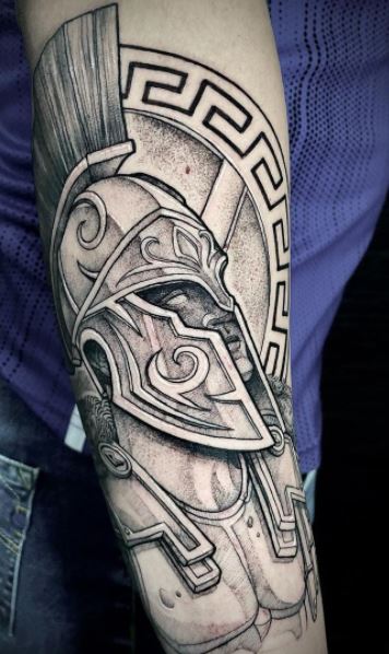 Spartan tattoo on the arm for men