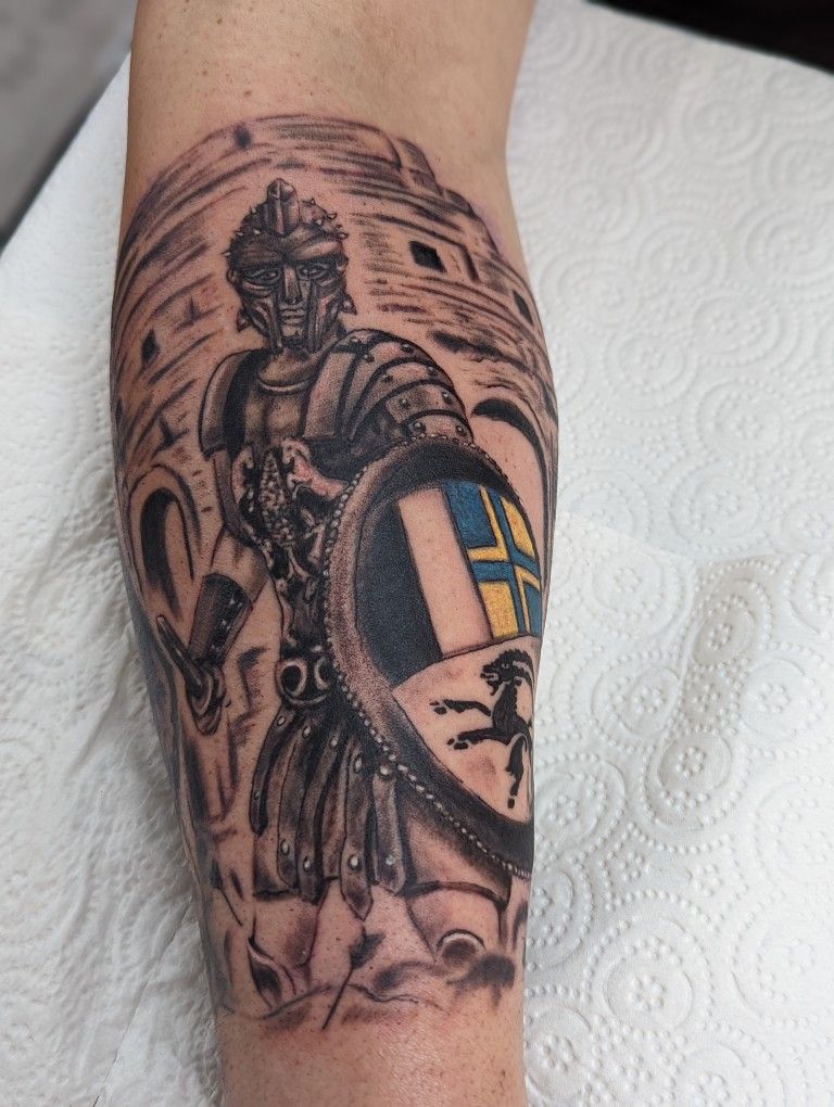 Gladiator tattoo on the forearm for men