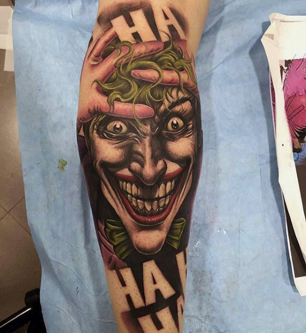 Joker tattoo on calf