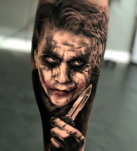 Joker tattoo on the forearm