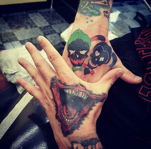 Joker tattoo on the wrist for men