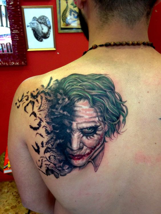 Joker tattoo on the back for men