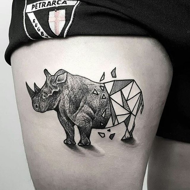 Rhinoceros tattoo on the hip for men