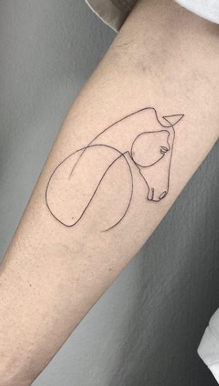 Horse tattoo on the forearm for women