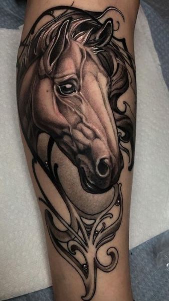 Tattoo of a horse on the shoulder for men