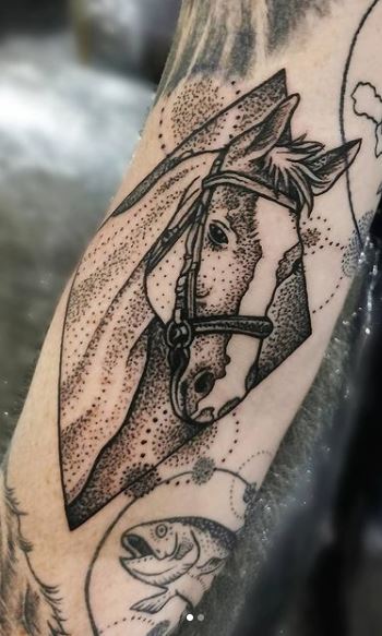 Horse tattoo on the forearm for men