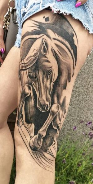 Horse tattoo on the hip for women