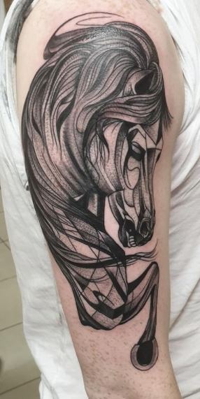 Tattoo of a horse on the shoulder for men