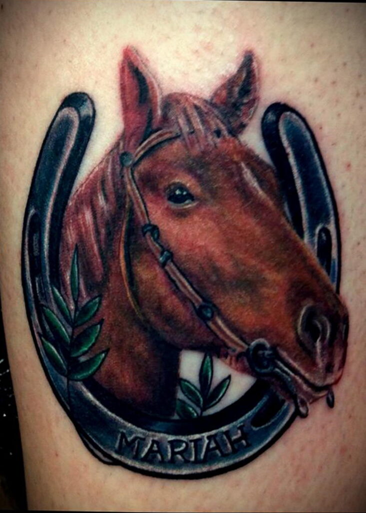 Tattoo of a horse on the leg