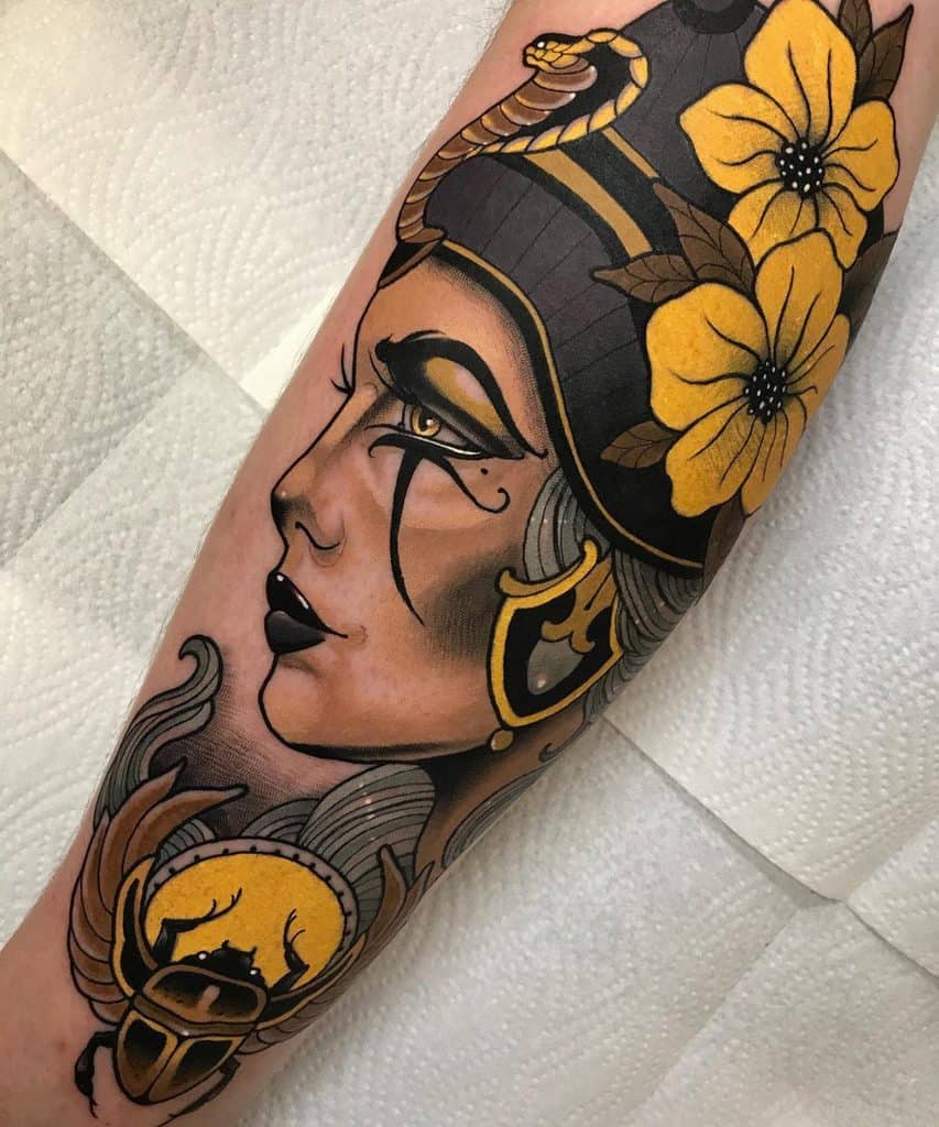 Nefertiti tattoo on the arm for women