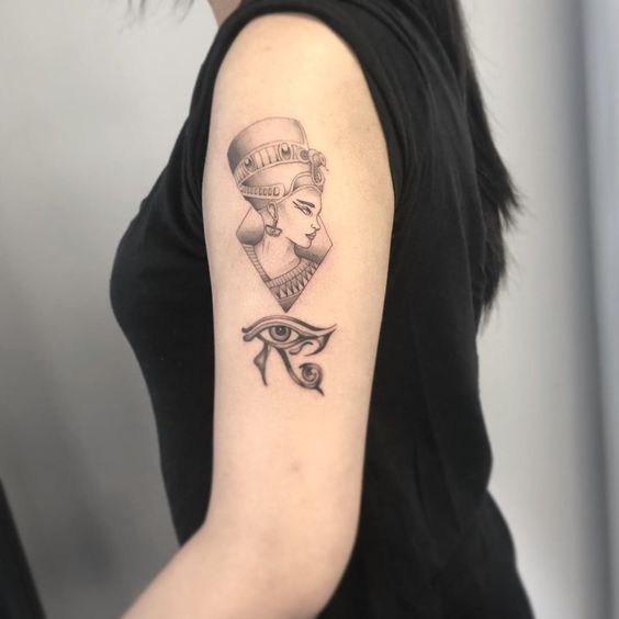 Tattoo of Nefertiti on the shoulder for women