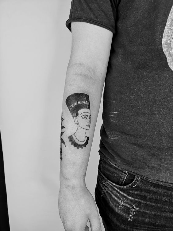 Nefertiti tattoo on the forearm for men