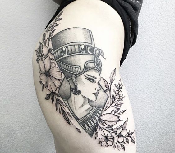 Tattoo of Nefertiti on the thigh for women