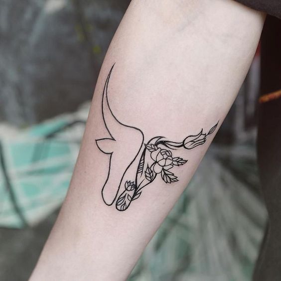 Bull tattoo on forearm for women