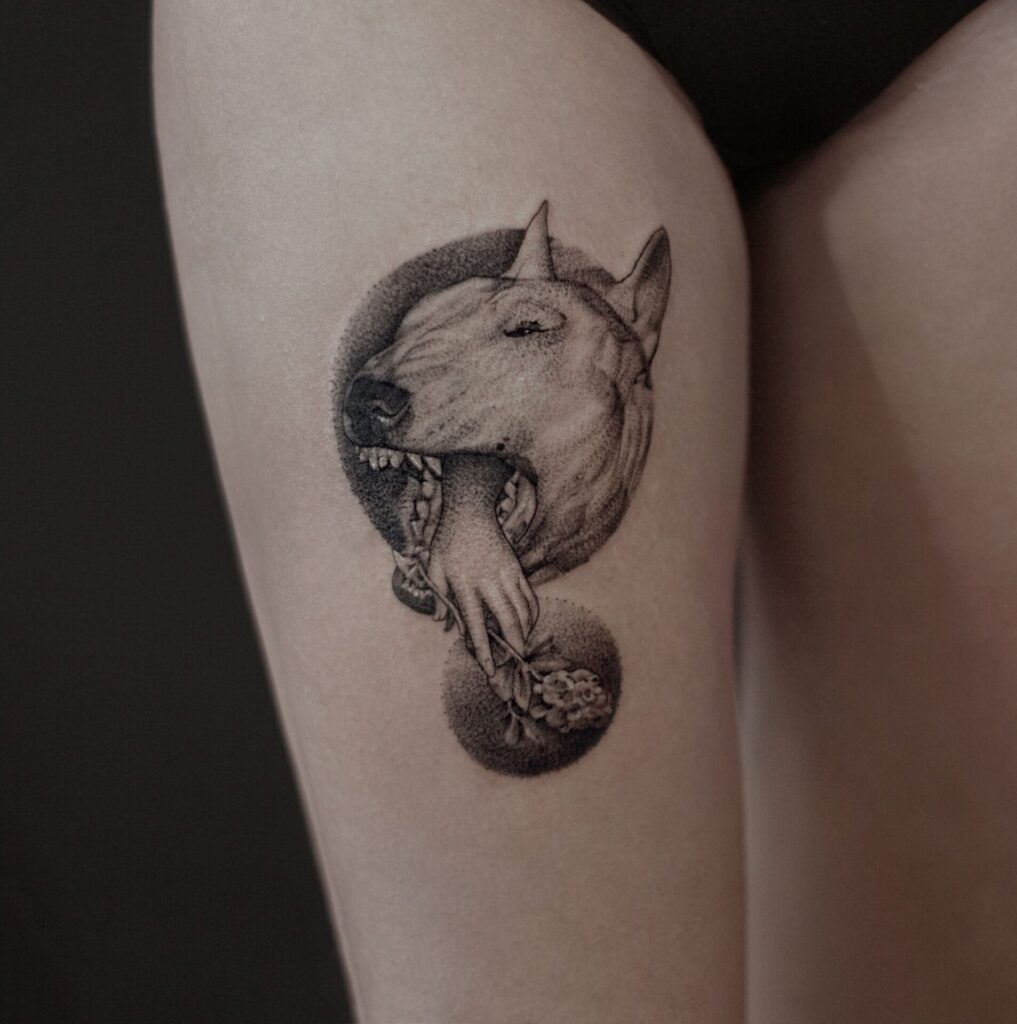 Bull Terrier tattoo on the hip for women