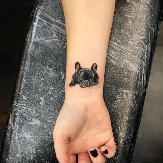 Bulldog tattoo on the wrist for women