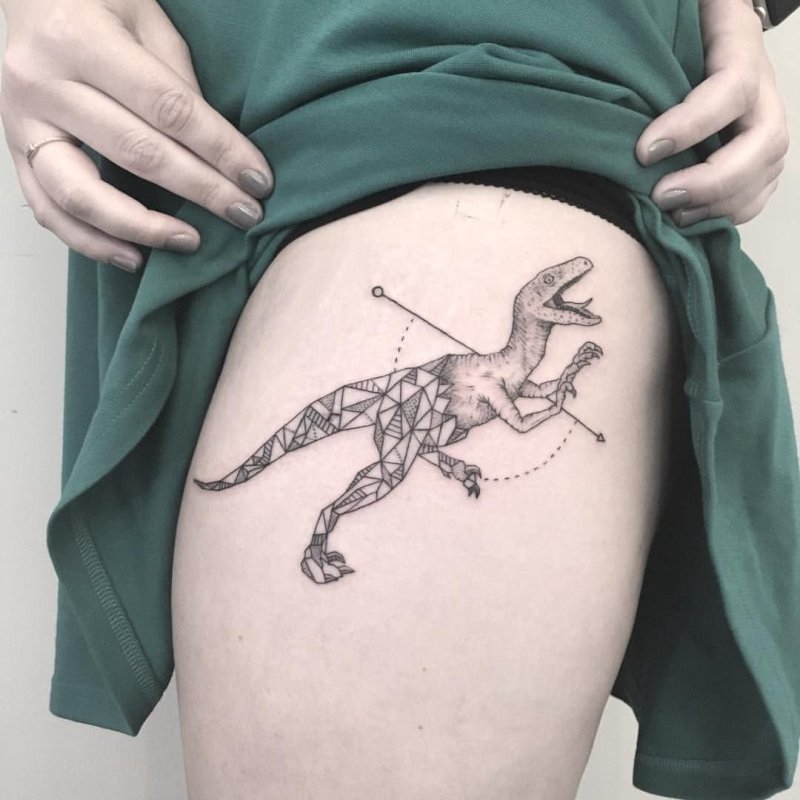 Dinosaur tattoo on the hip for women