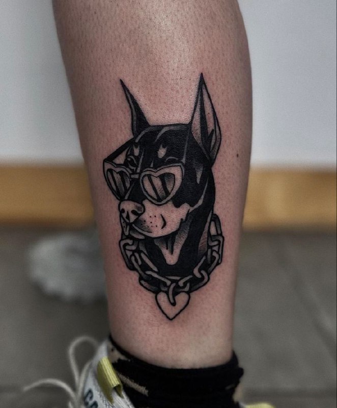 Doberman tattoo on the shin for men