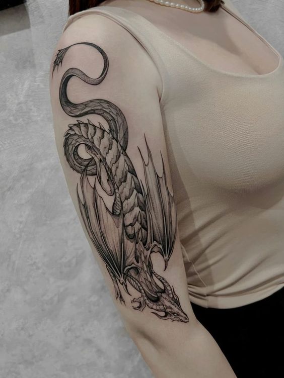 Dragon tattoo on the shoulder for women