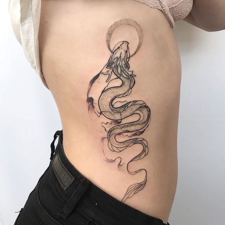 Dragon tattoo on the side for women