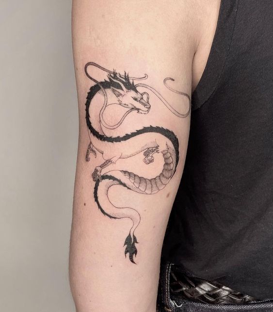 Dragon tattoo on the shoulder for men