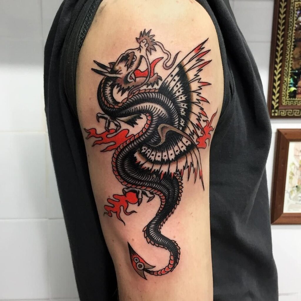 Dragon tattoo on the shoulder for men