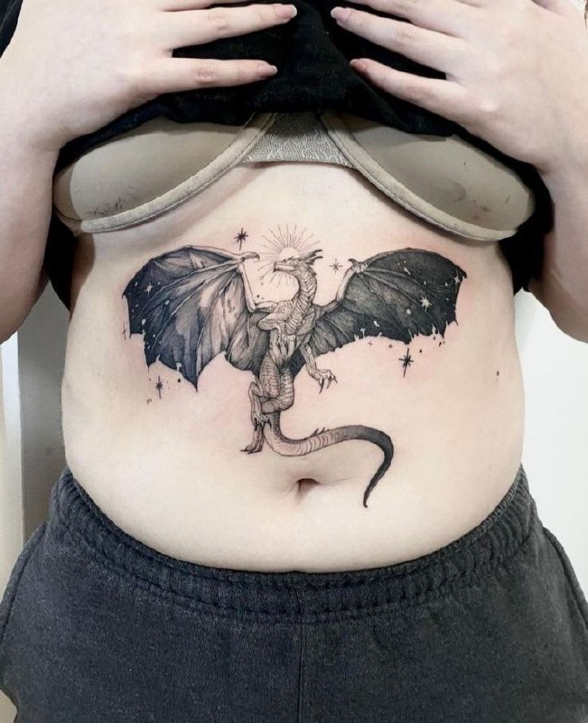 Dragon tattoo on the stomach for women