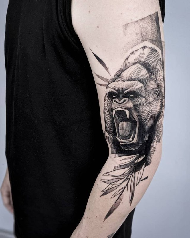 Gorilla tattoo on the arm for men