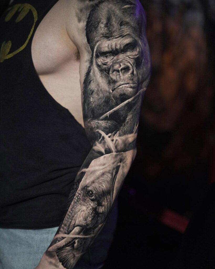 Tattoo of a gorilla on the arm for men