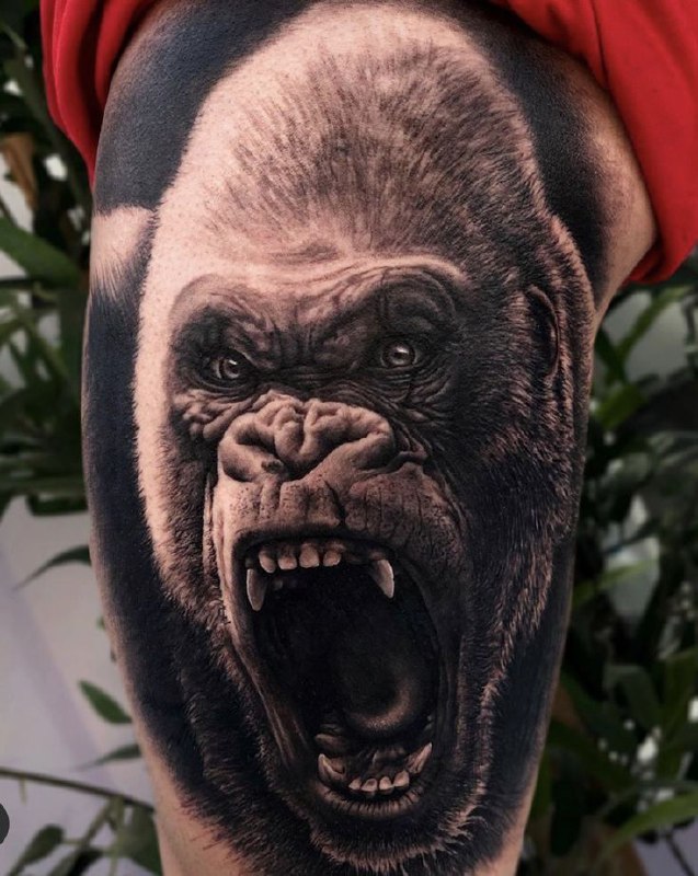 Gorilla tattoo on the thigh for men