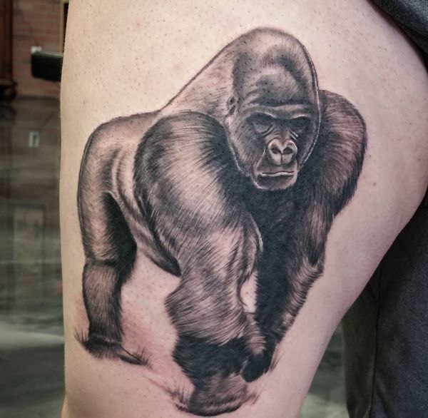 Gorilla tattoo on the thigh for men