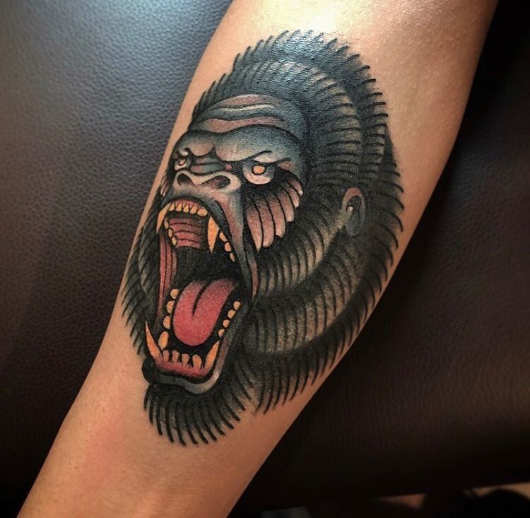 Tattoo of a gorilla on the arm for women