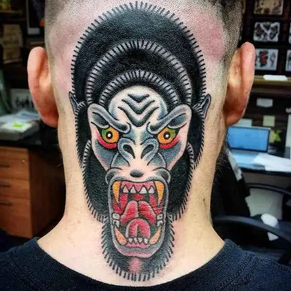 Tattoo of a gorilla on the back of the head for men