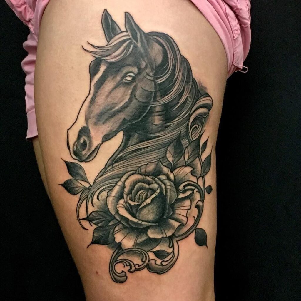 Horse tattoo on the hip for women