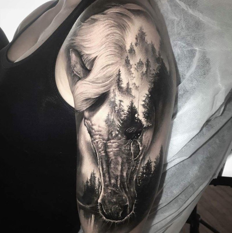 Tattoo of a horse on the shoulder for women