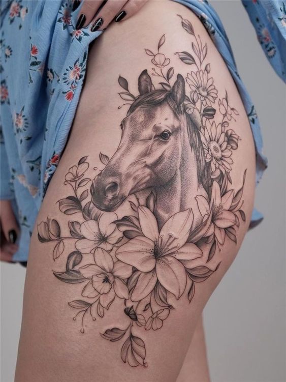 Horse tattoo on the hip for women