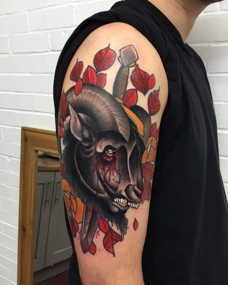 Tattoo of a ram on the shoulder for men