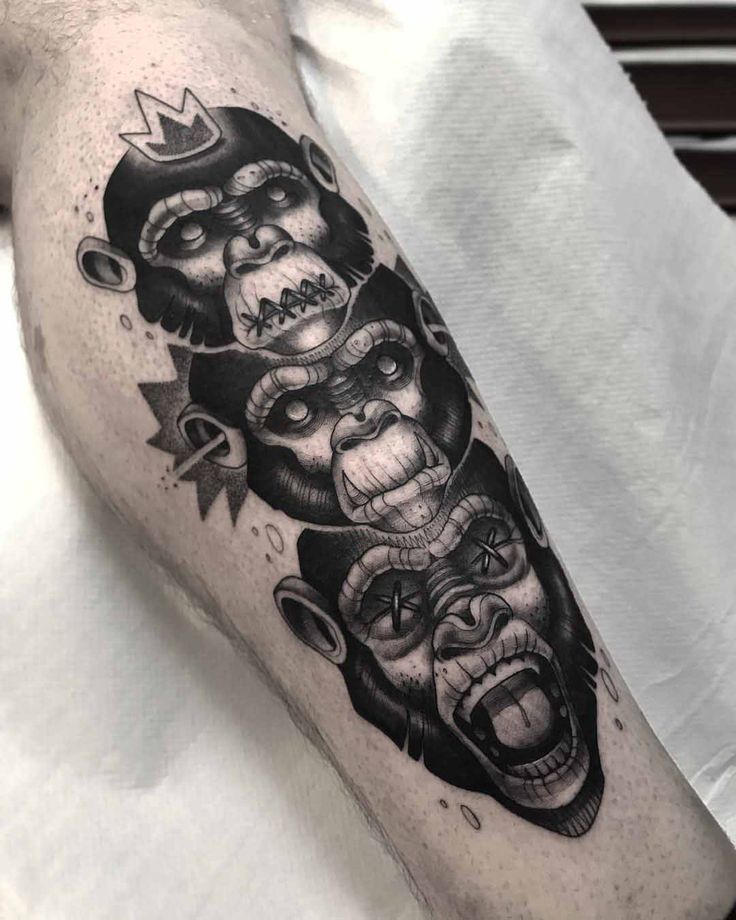 Monkey tattoo on the shin for men