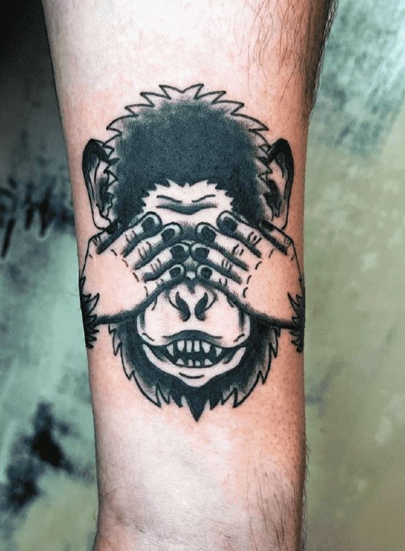 Monkey tattoo on the forearm for men