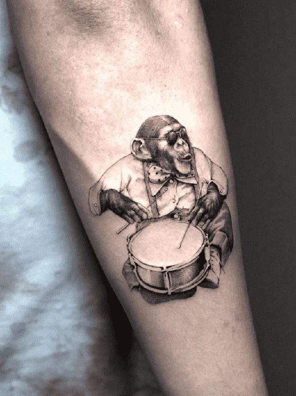 Monkey tattoo on the forearm for men