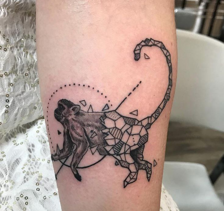 Monkey tattoo on the forearm for women