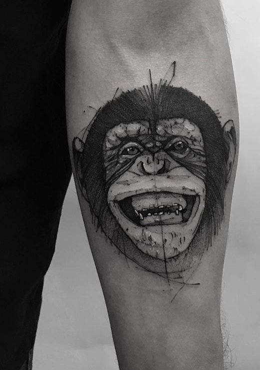 Monkey tattoo on the forearm for men