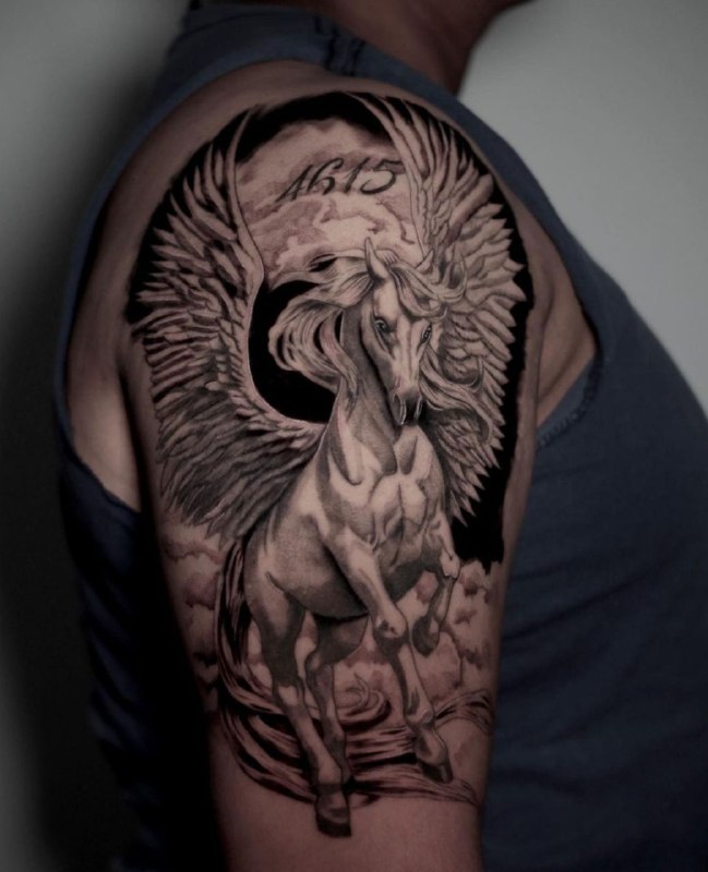 Pegasus tattoo on the shoulder for men