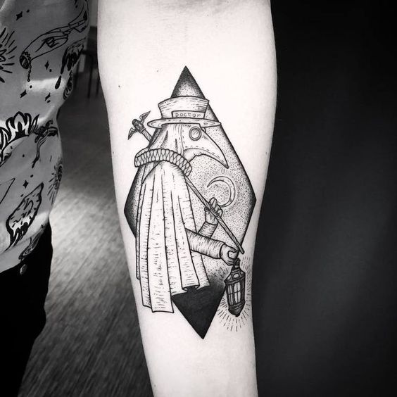 Plague doctor tattoo on forearm for men