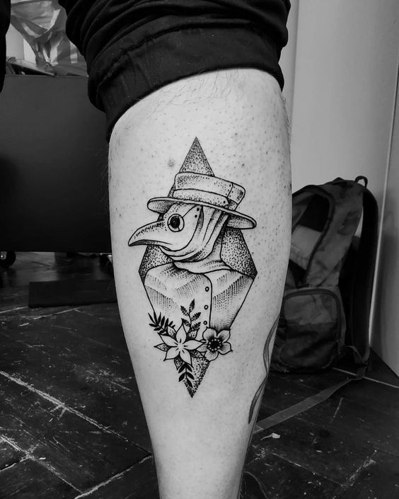 Plague doctor tattoo on the calf for men