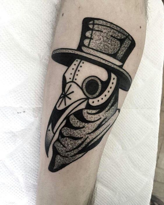 Plague doctor tattoo on the arm for men