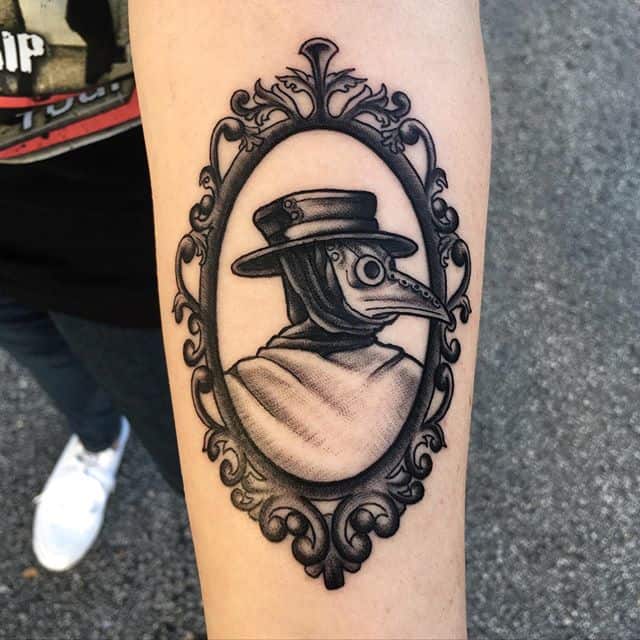 Plague doctor tattoo on forearm for men